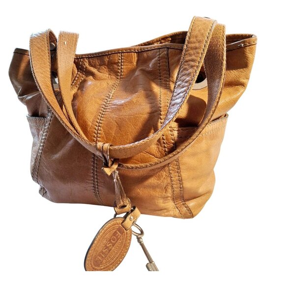 Fossil Handbags - Fossil Tan Leather Shoulder Bag With Grommet Details & Key Charm Boho Cozy